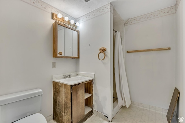 371 E 6770 S, Midvale, UT 84047 - bathroom featuring toilet, vanity, a stall shower, and tile patterned floors