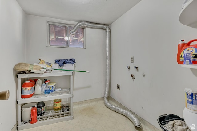 371 E 6770 S, Midvale, UT 84047 - laundry area with hookup for an electric dryer and tile patterned floors
