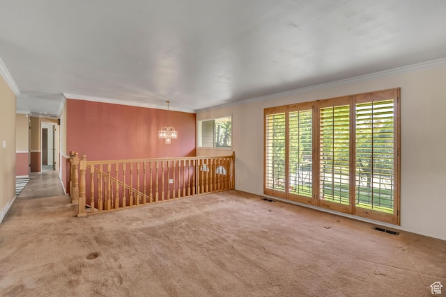 371 E 6770 S, Midvale, UT 84047 - unfurnished room featuring crown molding, a chandelier, and carpet floors