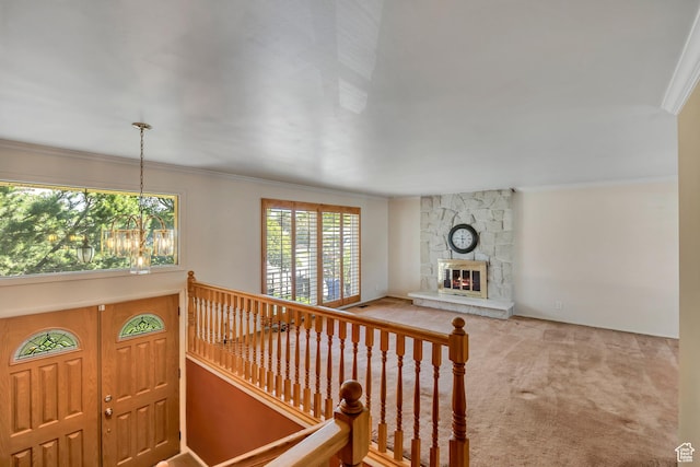 371 E 6770 S, Midvale, UT 84047 - stairs with carpet floors, ornamental molding, a chandelier, and a fireplace