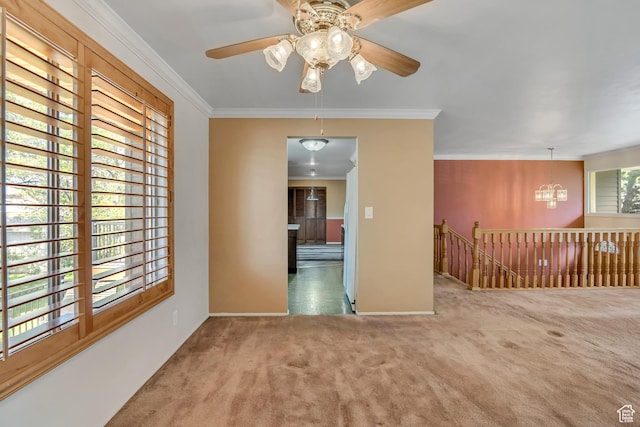 371 E 6770 S, Midvale, UT 84047 - empty room featuring carpet, ceiling fan, a chandelier, ornamental molding, and baseboards