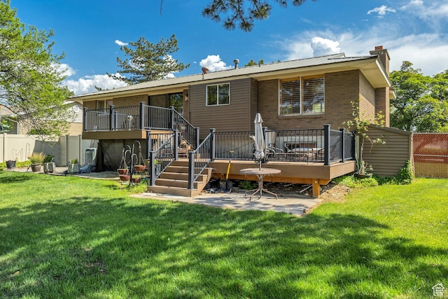 371 E 6770 S, Midvale, UT 84047 - rear view of property featuring stairs, a deck, and a chimney