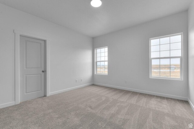 6737 N Tulle Mtn, Eagle Mountain, UT 84005 - unfurnished room with baseboards and carpet floors