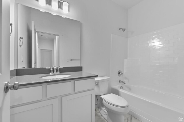 6737 N Tulle Mtn, Eagle Mountain, UT 84005 - full bath with marble finish floor, toilet, vanity, and shower / bathing tub combination