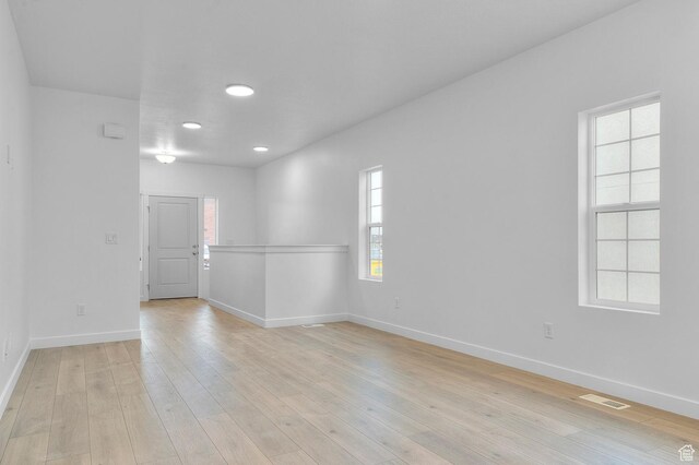 6737 N Tulle Mtn, Eagle Mountain, UT 84005 - empty room featuring baseboards, visible vents, recessed lighting, and light wood-style floors