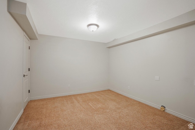 1321 E Farm Hill Dr, Salt Lake City, UT 84117 - empty room featuring baseboards and light colored carpet