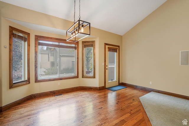 1321 E Farm Hill Dr, Salt Lake City, UT 84117 - empty room featuring an inviting chandelier, visible vents, light wood finished floors, and baseboards