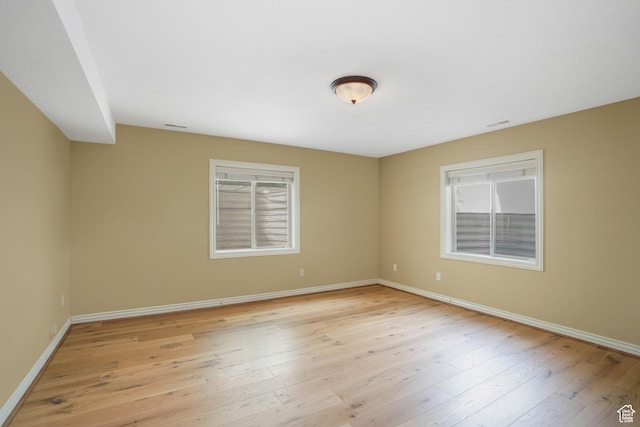 1321 E Farm Hill Dr, Salt Lake City, UT 84117 - empty room featuring light wood-style flooring and baseboards