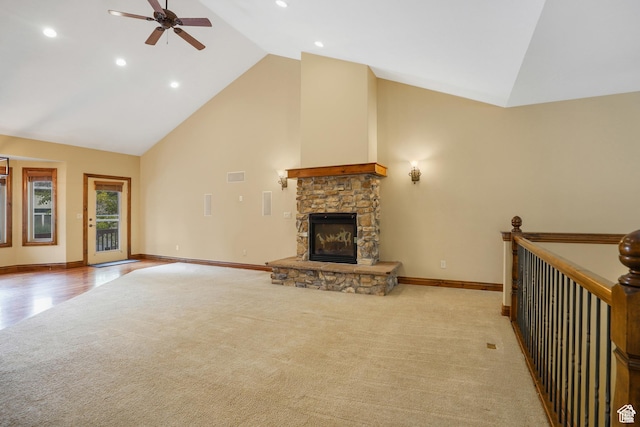 1321 E Farm Hill Dr, Salt Lake City, UT 84117 - unfurnished living room with high vaulted ceiling, a ceiling fan, carpet, a fireplace, and baseboards