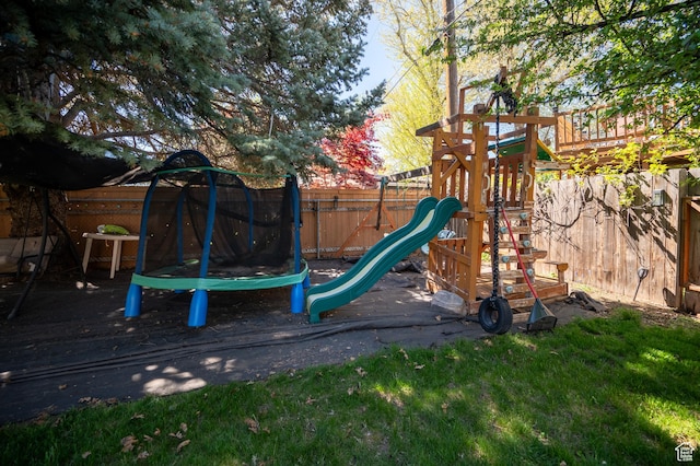 336 W 200 N, Bountiful, UT 84010 - view of play area featuring a trampoline and a fenced backyard