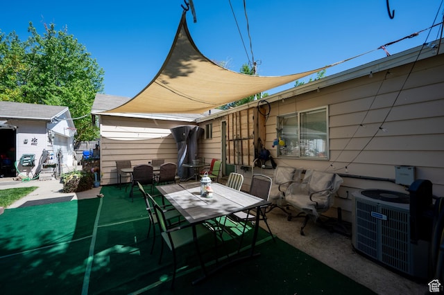 336 W 200 N, Bountiful, UT 84010 - view of patio with central AC unit, an outbuilding, and outdoor dining space