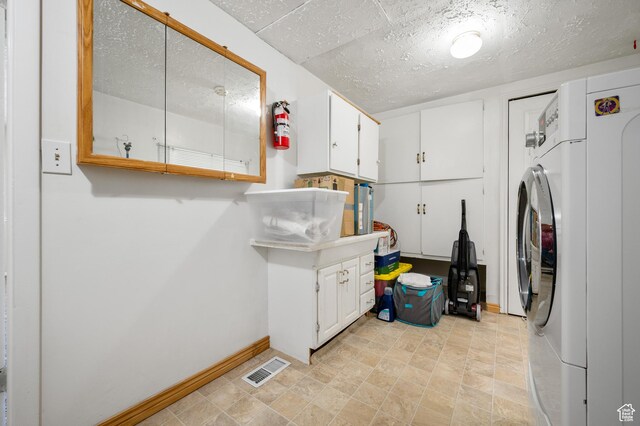 336 W 200 N, Bountiful, UT 84010 - laundry room with cabinet space, washer / dryer, a textured ceiling, visible vents, and baseboards