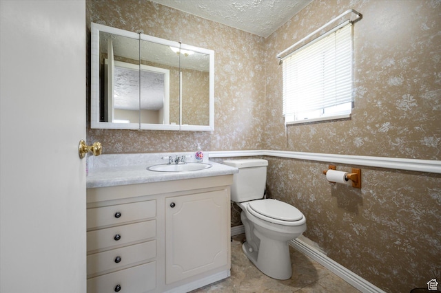 336 W 200 N, Bountiful, UT 84010 - bathroom featuring toilet, vanity, a textured ceiling, tile patterned floors, and wallpapered walls