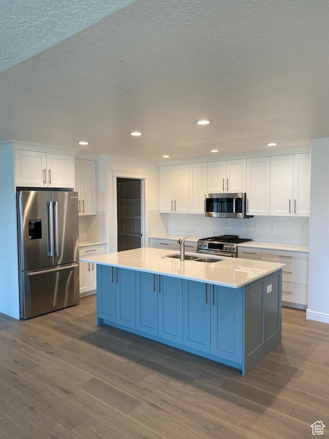 332 N 3250 W Unit 3, West Point, UT 84015 - kitchen with white cabinets, dark wood-style flooring, stainless steel appliances, and a sink