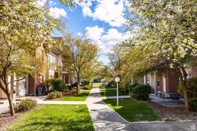2503 S 160 E Unit 6D, Ogden, UT 84401 - surrounding community with a lawn