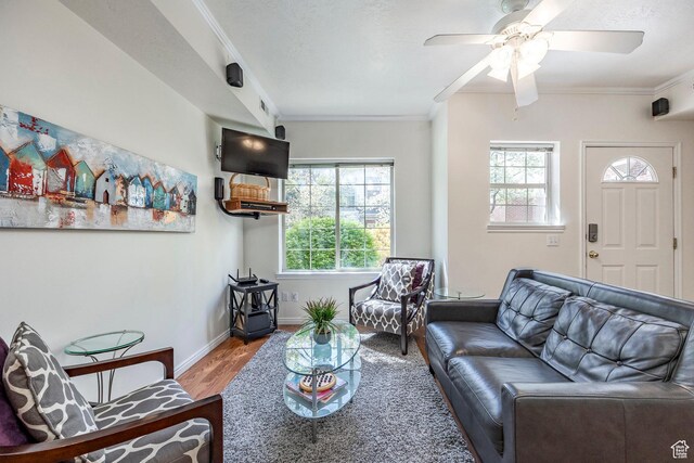 2503 S 160 E Unit 6D, Ogden, UT 84401 - living room featuring ceiling fan, baseboards, crown molding, and wood finished floors
