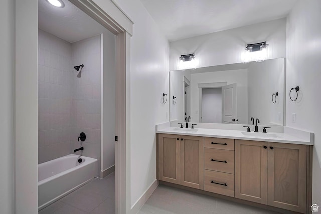 819 W Sara Dr, Saratoga Springs, UT 84045 - bathroom with washtub / shower combination, tile patterned flooring, a sink, and double vanity