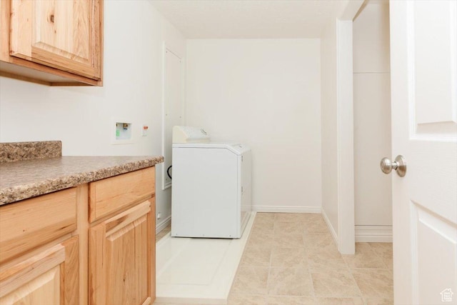 1176 E 900 S, Preston, ID 83263 - washroom featuring washer / clothes dryer, cabinet space, and light tile patterned floors