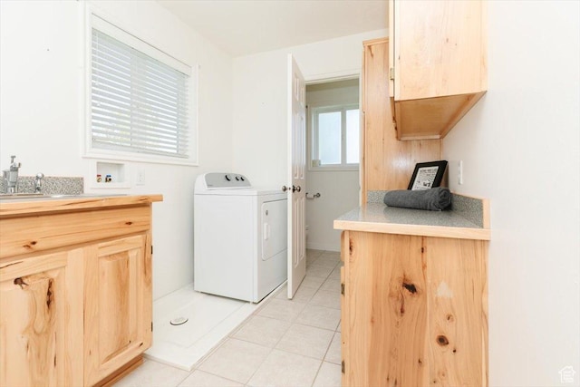 1176 E 900 S, Preston, ID 83263 - washroom with washer / dryer, light tile patterned flooring, and cabinet space