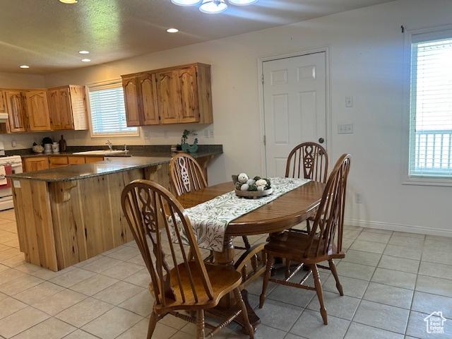 1176 E 900 S, Preston, ID 83263 - dining space featuring light tile patterned floors and recessed lighting