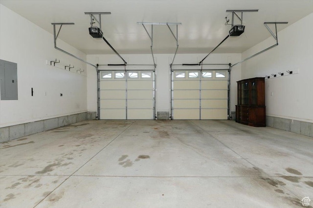 1176 E 900 S, Preston, ID 83263 - garage featuring electric panel and a garage door opener