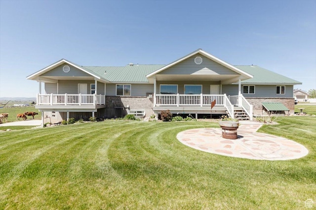 1176 E 900 S, Preston, ID 83263 - back of house with a lawn and an outdoor fire pit