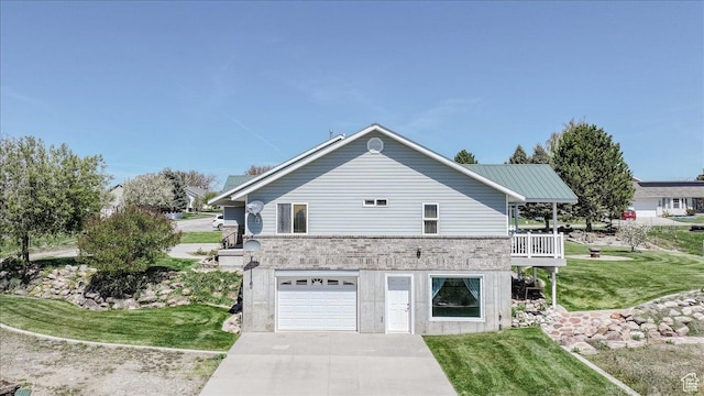 1176 E 900 S, Preston, ID 83263 - view of property exterior featuring an attached garage, a yard, and driveway