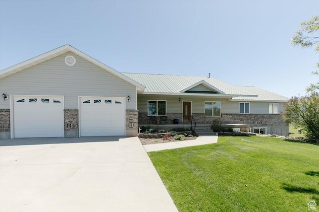 1176 E 900 S, Preston, ID 83263 - single story home with driveway, a front lawn, an attached garage, and covered porch