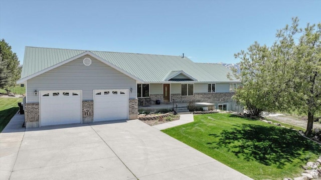 1176 E 900 S, Preston, ID 83263 - view of front of home featuring driveway, a garage, a front lawn, and a porch