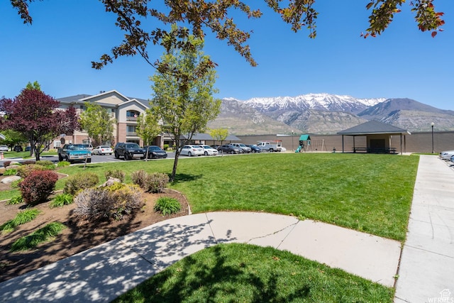 165 S Pleasant Grove Blvd Unit 45, Pleasant Grove, UT 84062 - view of community with a yard and a mountain view
