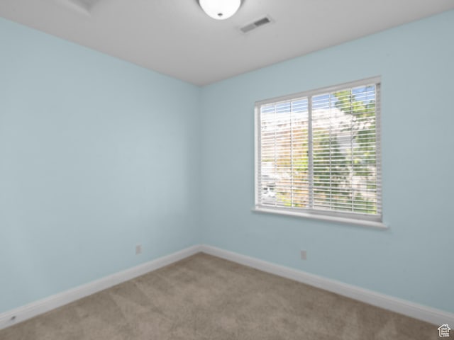 165 S Pleasant Grove Blvd Unit 45, Pleasant Grove, UT 84062 - carpeted spare room with baseboards and visible vents