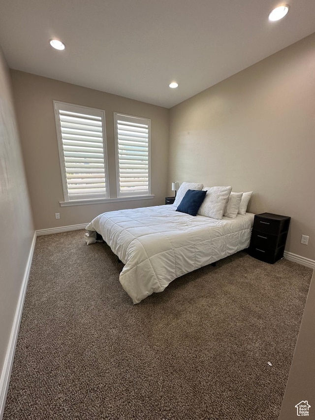 bedroom featuring recessed lighting, carpet flooring, and baseboards