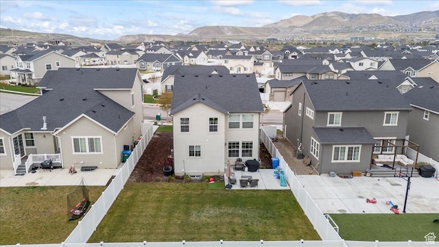 aerial view with a mountain view and a residential view