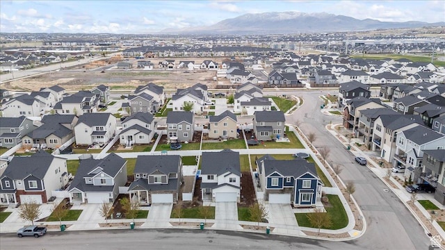 drone / aerial view with a mountain view and a residential view