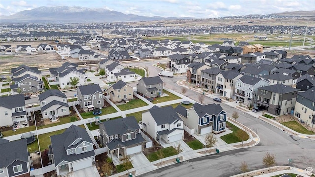 bird's eye view featuring a mountain view and a residential view