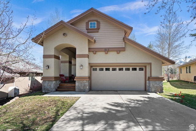 view of front facade featuring a garage, concrete driveway, stone siding, a front yard, and stucco siding