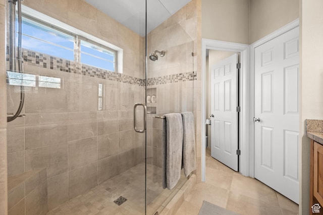 1975 Picabo St, Park City, UT 84098 - full bathroom featuring tile patterned floors, vanity, and a shower stall