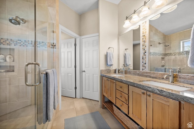 1975 Picabo St, Park City, UT 84098 - bathroom with tile patterned flooring, a sink, double vanity, and a stall shower
