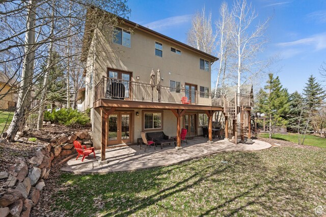 1975 Picabo St, Park City, UT 84098 - rear view of house with stairs, stucco siding, a patio area, french doors, and a lawn