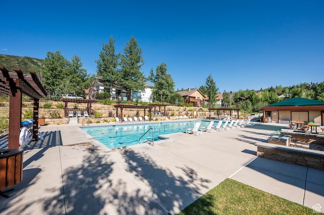 1975 Picabo St, Park City, UT 84098 - pool with fence, a pergola, and a patio