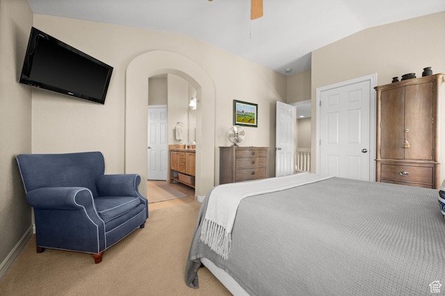 1975 Picabo St, Park City, UT 84098 - bedroom featuring arched walkways, vaulted ceiling, baseboards, and light colored carpet