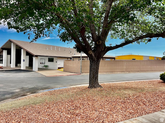 1150 W Red Hills Pkwy Unit 113, Washington, UT 84780 - view of yard with fence and a patio area