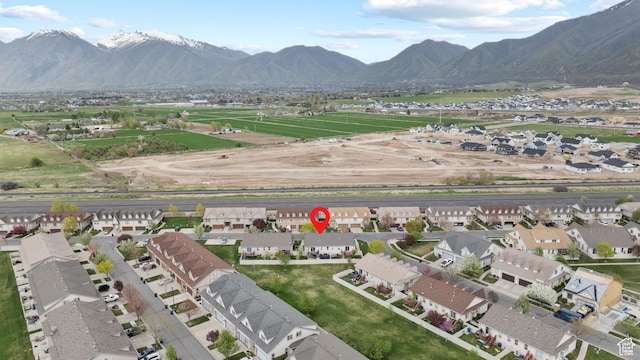 aerial view featuring a mountain view and a residential view