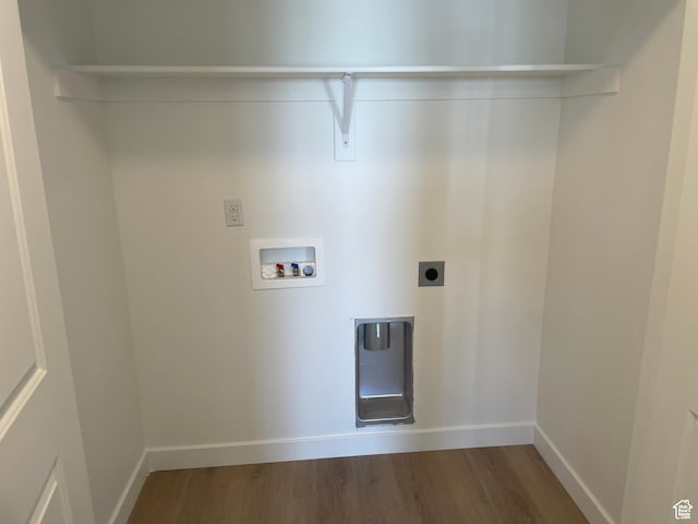 laundry area featuring wood finished floors, hookup for a washing machine, laundry area, and hookup for an electric dryer