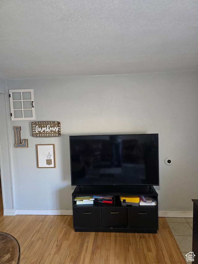 322 S 800 W, Vernal, UT 84078 - details featuring wood finished floors, baseboards, and a textured ceiling