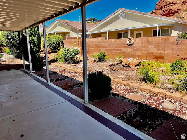 1050 W Red Hills Pkwy Unit 64, Washington, UT 84780 - view of patio with fence