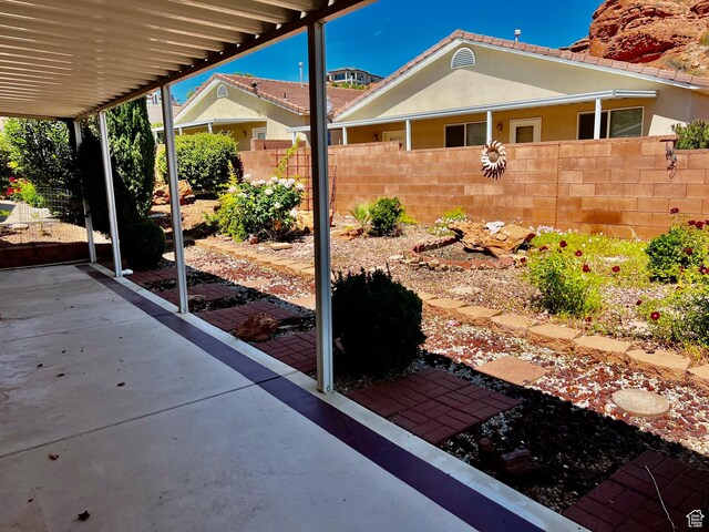 1050 W Red Hills Pkwy Unit 64, Washington, UT 84780 - view of patio with fence