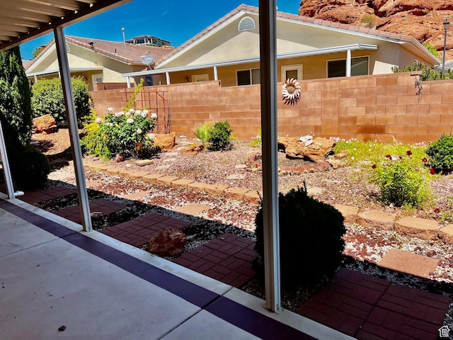 1050 W Red Hills Pkwy Unit 64, Washington, UT 84780 - view of yard with fence