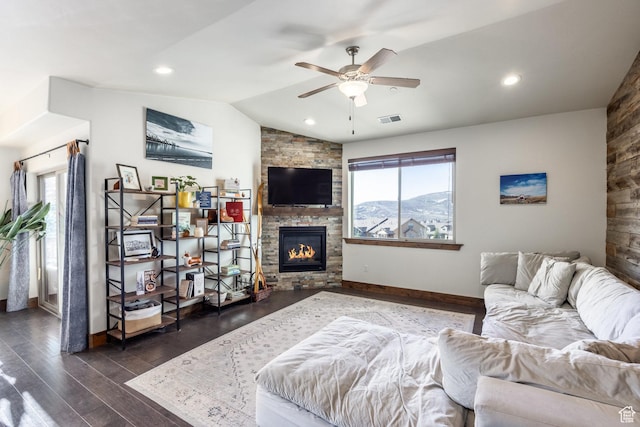 living room with lofted ceiling, visible vents, a ceiling fan, and a healthy amount of sunlight