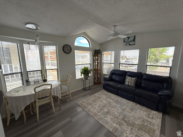 1150 W Red Hills Pkwy Unit 137, Washington, UT 84780 - living area featuring a ceiling fan, a textured ceiling, light wood-type flooring, vaulted ceiling, and baseboards